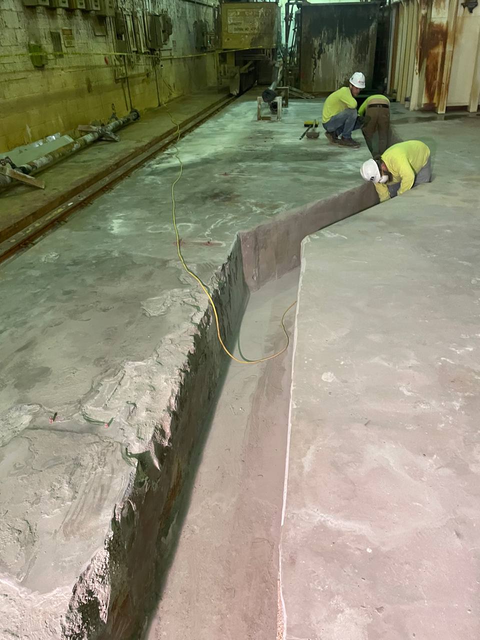 Liberty Steel trench area during prep and repair work before resurfacing